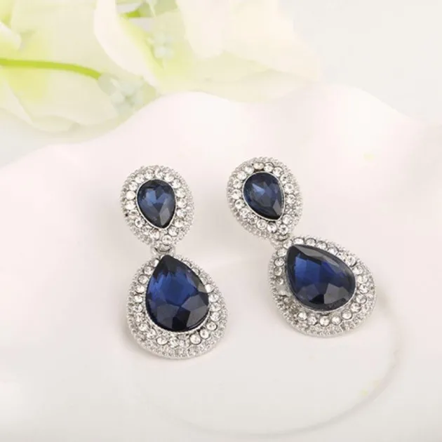 Juego de aretes y collar con colgante de gota de cristal azul