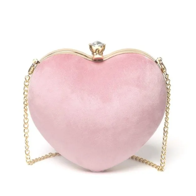 Heart-shaped hand holding chain bag