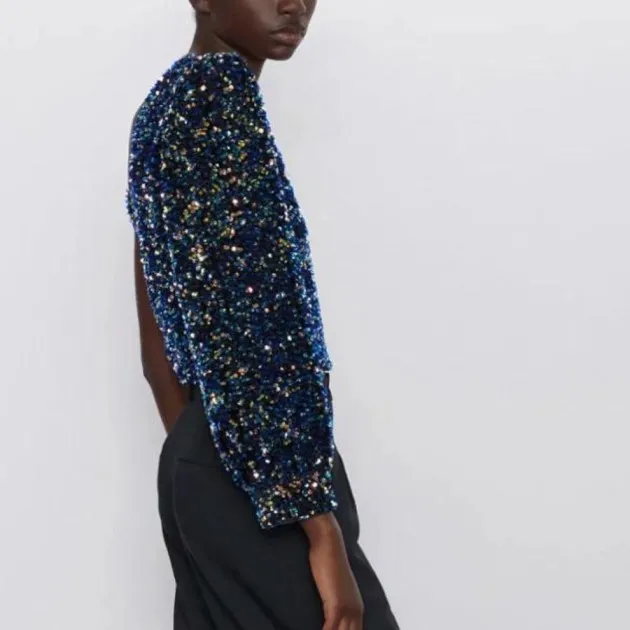 Sequined Asymmetric Top